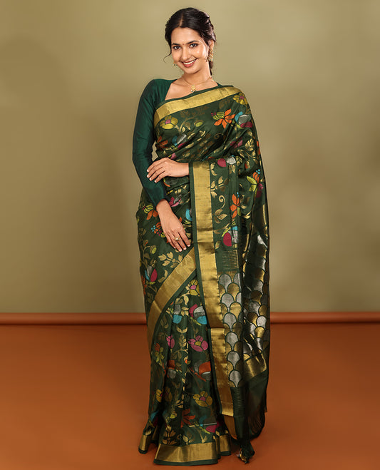Green Uppada Saree, Artfully Detailed with Meenakari Floral Vine Weave, a Subtle Zari Border, Scallop-Patterned Pallu, and a Matching Blouse