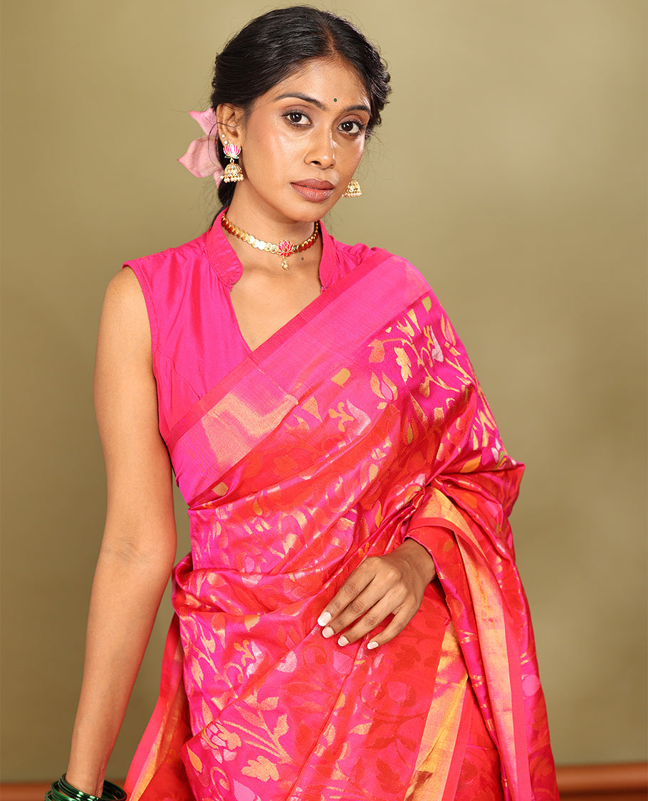 Rani Pink Uppada Saree, Enriched with Floral Vine Weave, a Subtle Zari Border, a Gleaming Zari Pallu, and a Matching Blouse
