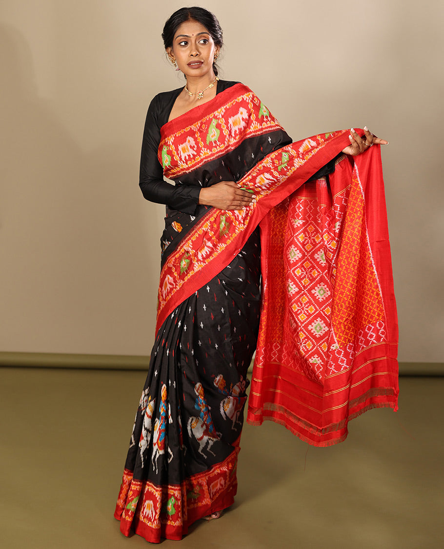 Black Pochampally Ikat Saree, Adorned with Buttas and Horse Rider Ikat Weave, a Contrast Ikat Animal Weave Border, Jaal Pallu, and a Contrast Blouse