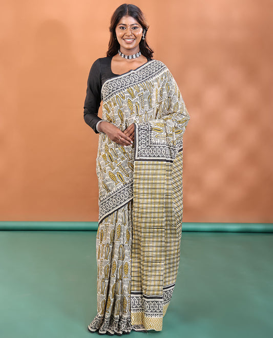 Off-White-base Modal Cotton Saree, Artfully Designed with Fish Motifs Printed All Across Its Body, Subtly Block Printed Border, Pallu Features Checked Patterns, And Paired With a Contrast Printed Blouse