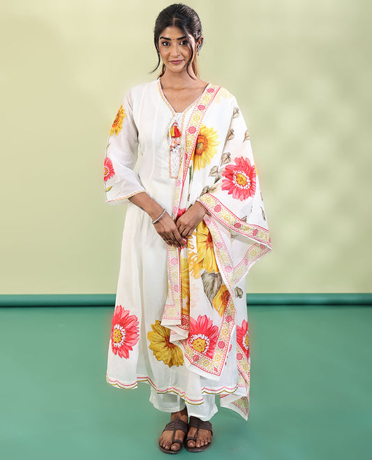 White Cotton Readymade Suit, Features Sunflower Print with Outline Embroidered V-neck 3/4 th Sleeved Umbrella Top, a Subtle Straight-Cut Pants, and a Floral Print-Embroidered Dupatta