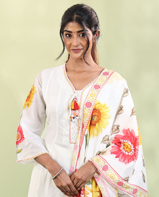 White Cotton Readymade Suit, Features Sunflower Print with Outline Embroidered V-neck 3/4 th Sleeved Umbrella Top, a Subtle Straight-Cut Pants, and a Floral Print-Embroidered Dupatta