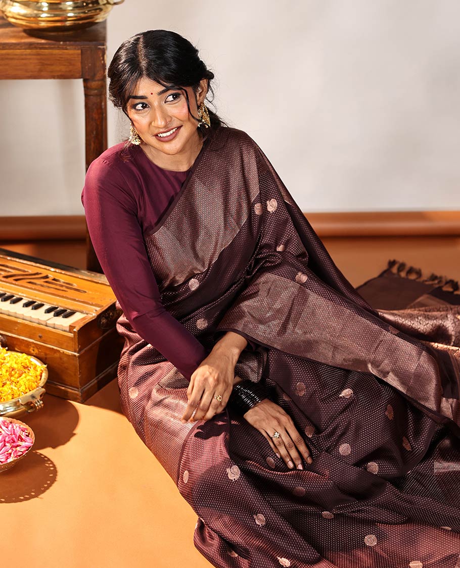 Coffee Brown Vasundhara Silk Saree, Finely Crafted with Raindrop Buttas, and Annam Chakram Bu\ttas on Its Body, Highlighted by a Zari Geometric-Textured Border, Gleaming Copper-Colored Zari Pallu of Jaal Designs, and Paired with a Matching Blouse
