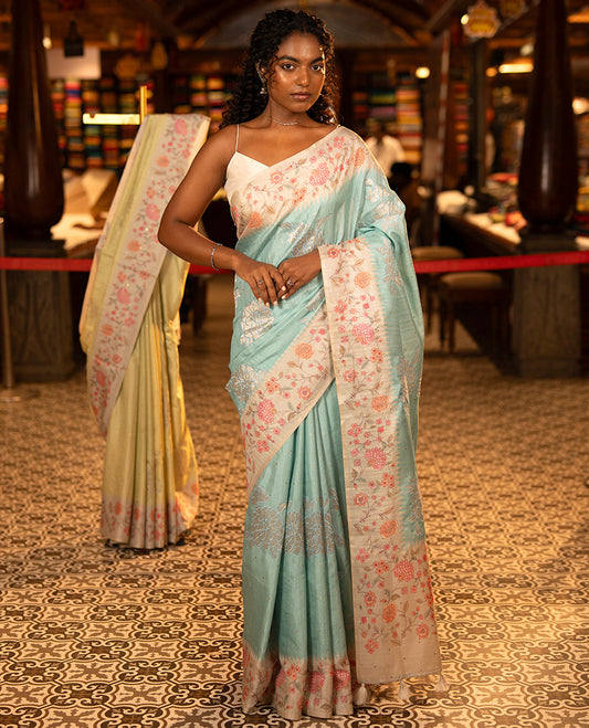 Blue Fancy Tussar Silk Saree, Gleamed Up with Zari Buttas, and Applique Embroidery on Its Body, Complemented by a Contrast Temple Floral Creeper Printed Border, Pallu of Floral Creeper Print, and Paired with a Contrast Blouse