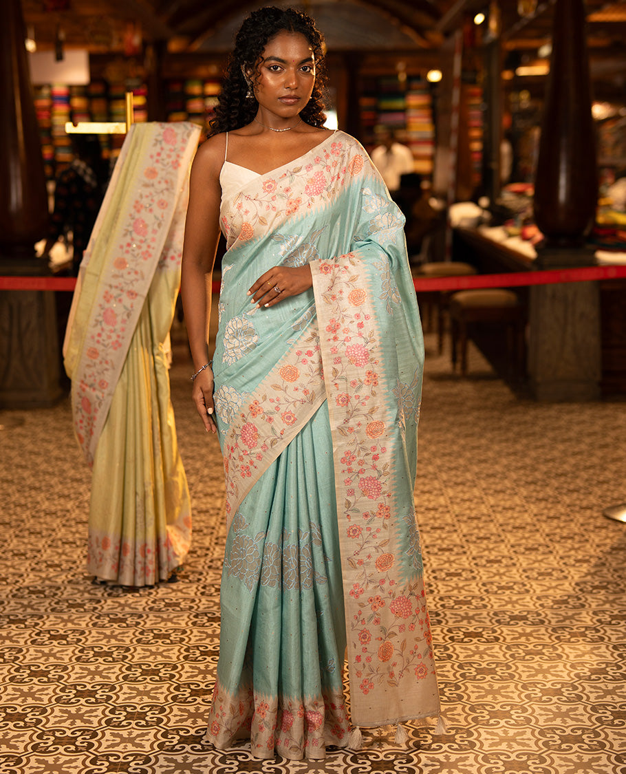 Blue Fancy Tussar Silk Saree, Gleamed Up with Zari Buttas, and Applique Embroidery on Its Body, Complemented by a Contrast Temple Floral Creeper Printed Border, Pallu of Floral Creeper Print, and Paired with a Contrast Blouse