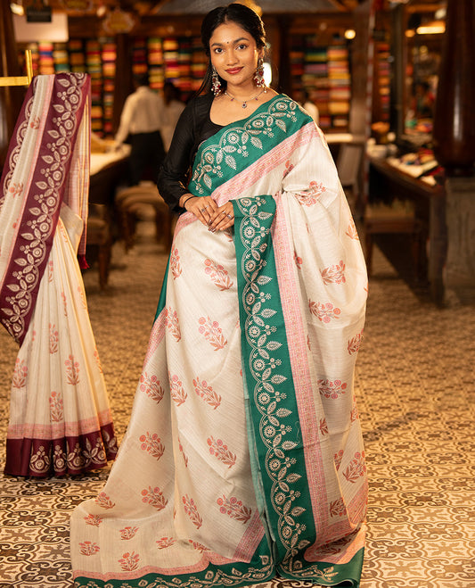 Maragatha Green Green-Silk Saree, Mesmerized with Floral Motifs, Block Print on Its Body, Complemented by a Contrast Thread Embroidered Border, Pallu of Floral Block Print, and Paired with a Contrast Blouse