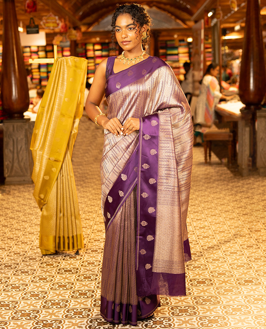 Purple Russian Dola Silk Saree, Meticulously Crafted with Zari Zig-Zag Jacquard on Its Body, Highlighted by Zari Buttas Woven Satin Border, Intricately Designed Pallu, and Paired with a Matching Blouse