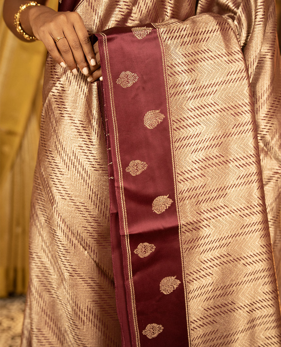 Magenta Pink Russian Dola Silk Saree, Gracefully Embellished with Zari Zig-Zag Jacquard on Its Body, Highlighted by Zari Buttas Woven Satin Border, Intricately Designed Pallu, and Paired with a Matching Blouse
