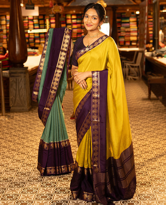 Mustard Plain Dola Silk Saree, Complemented by Contrast Rettai Pettu Ganda Berunda Motifs, Zari Border, Gleaming Zari Striped Pallu, and Paired with a Contrast Blouse