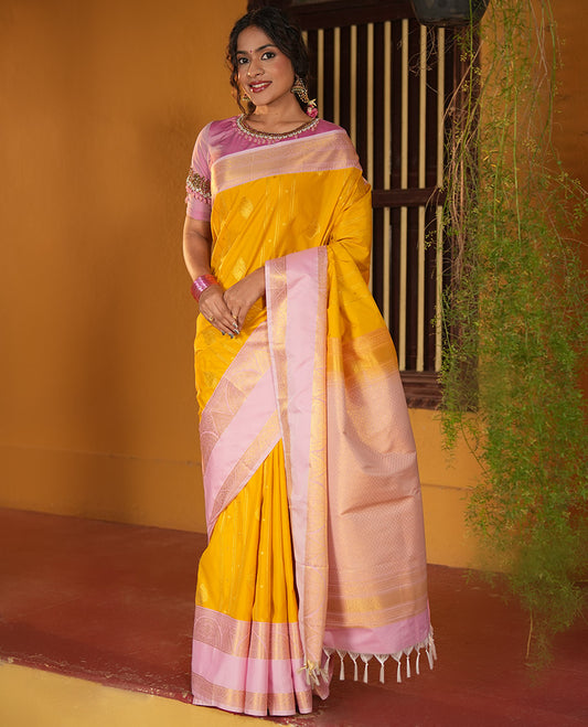 Turmeric Yellow and Light Pink Budget Silk Saree, Decorated with Zari Designs on Its Body, Complemented by a Contrast Rettai Pettu Traditional Zari Border, Grand Jaal Pallu, and Paired with a Contrast Blouse