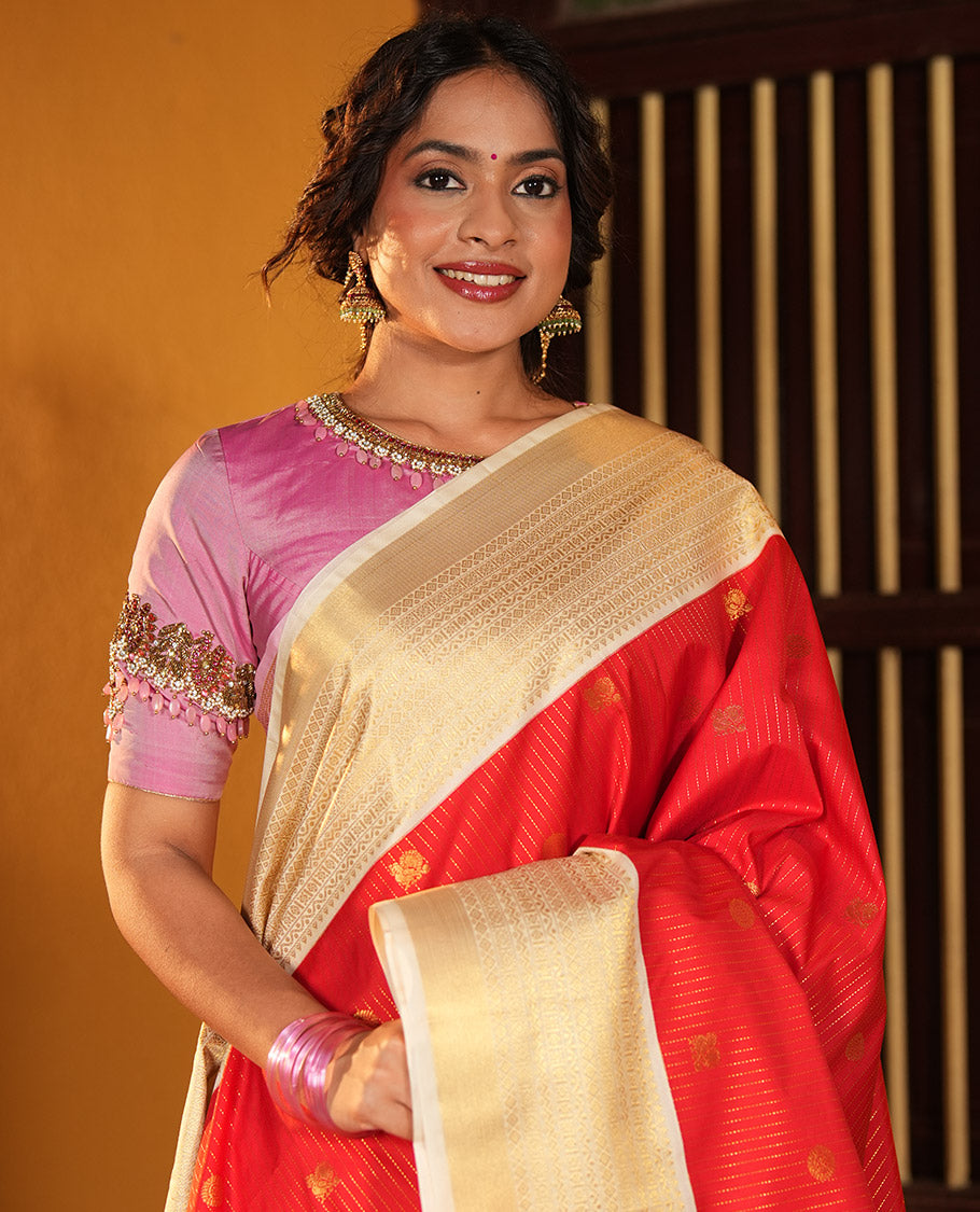Rust Orange and Off-White Budget Silk Saree, Accentuated with Vaira Oosi, and Mayil-Chakram Designs on Its Body, Complemented by Contrast Traditional Zari Design Border, Chevron-Striped Pallu, and Paired with a Contrast Blouse