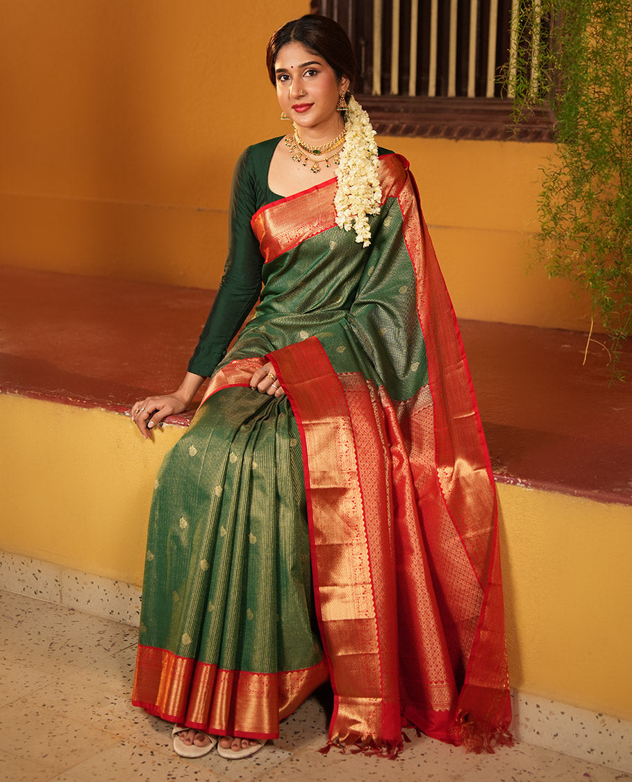 Green and Red Budget Silk Saree, Delicately Woven with Zari Buttas and Checks on Its Body, Complemented by a Contrast Traditional Zari Border of Peacock Designs, Grand Pallu, and Paired with a Contrast Blouse