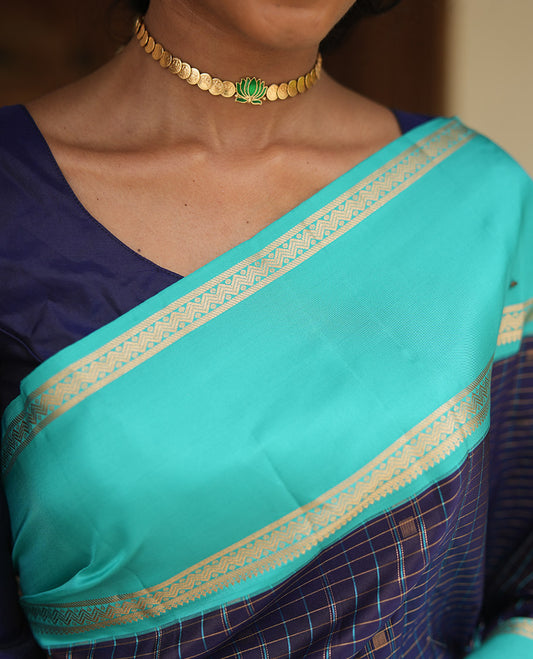 Navy Blue-Sapphire Blue Vasundhara Silk Saree Features Zari Butta and Checks, Contrast Rettai Pettu Border, Jaal Pallu, and a Contrast Blouse
