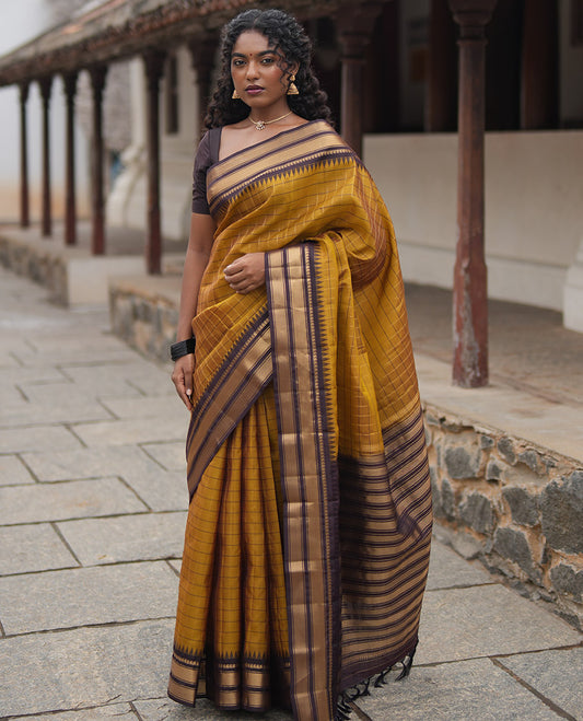 Mehendi Green and Brown Vasundhara Lite Silk Mix Saree, Graced with Checked Design All Over Its Body, Complemented by a Contrast Thazampoo Rekku Border of Manga Mokku, Muthu, and Mayil Kann Designs, Grand Pallu, and Paired with a Contrast Blouse