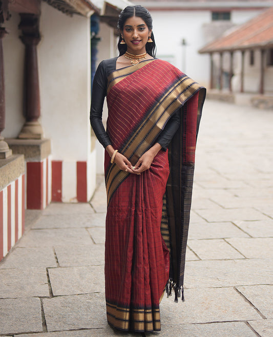 Rust Maroon and Dark Purple Vasundhara Lite Silk Mix Saree, Accentuated with Checked Design All Over Its Body, Complemented by a Contrast Thazampoo Rekku Border of Manga Mokku, Muthu, and Mayil Kann Designs, Grand Pallu, and Paired with a Contrast Blouse