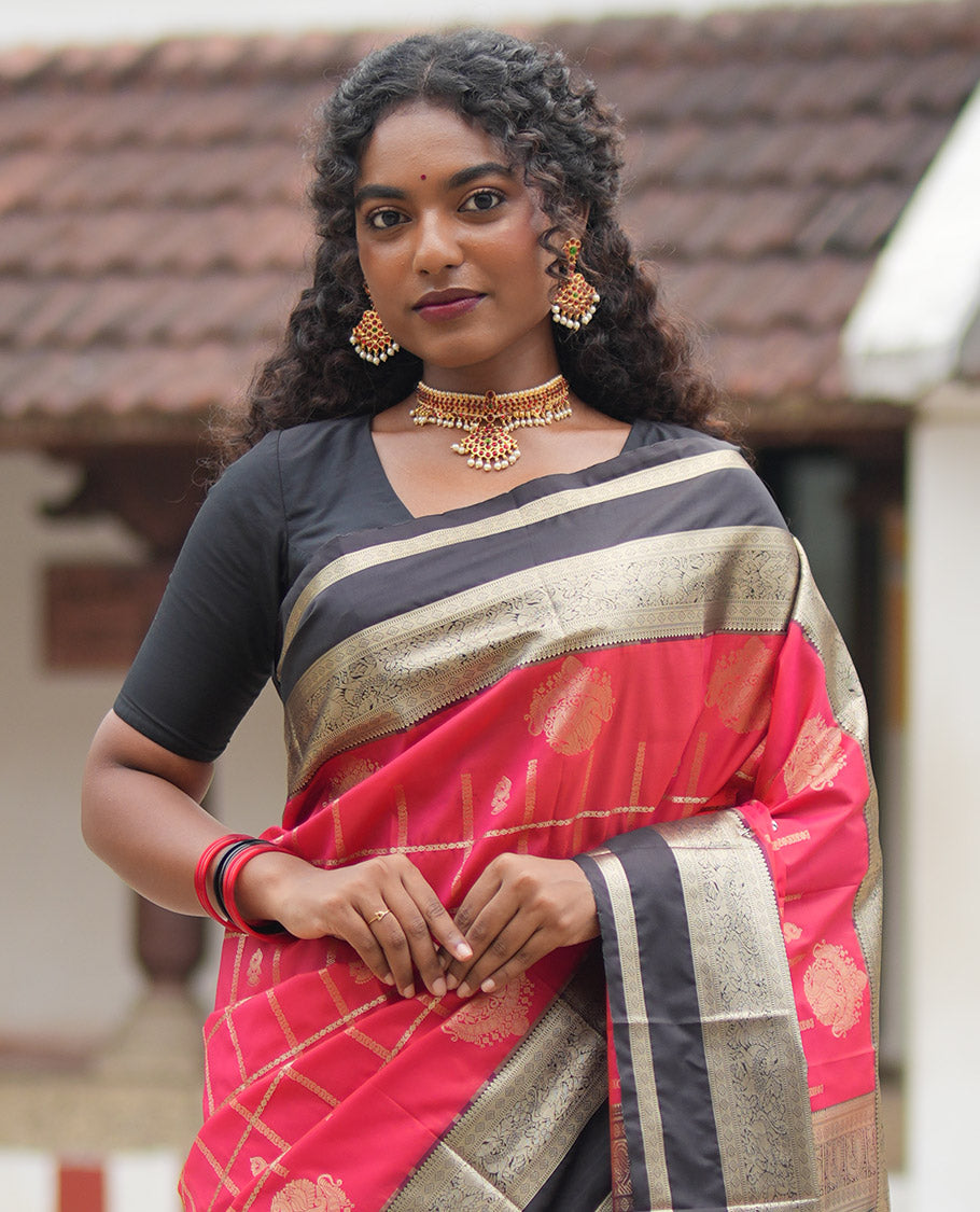 Reddish Orange Budget Silk Saree, Entralled with Jhumka Butta Enclosed Checks On Its Body, Complemented by Contrast Traditional Zari Rettai Pettu Border, Grand Pallu and Paired with a Contrast Blouse