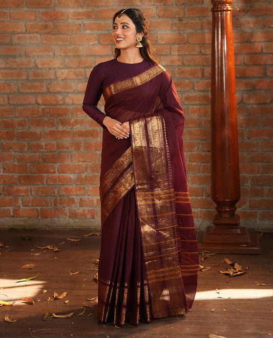 Brown Plain Chettinad Cotton Saree, Accentuated with a Gleaming Zari Rettai Pettu Border Featuring Elephant and Peacock Motifs, Subtly Striped Pallu, and Paired with a Matching Blouse