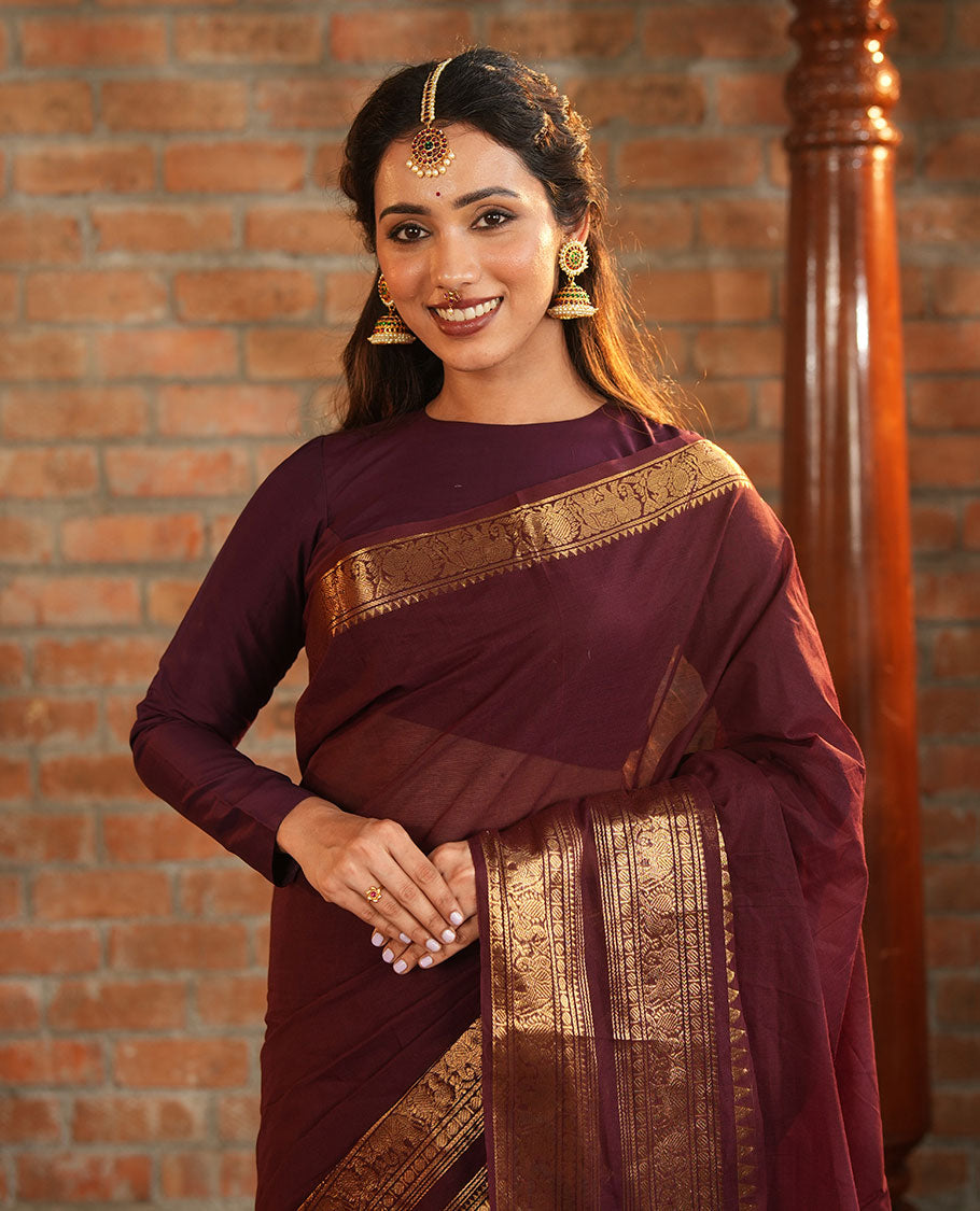 Brown Plain Chettinad Cotton Saree, Accentuated with a Gleaming Zari Rettai Pettu Border Featuring Elephant and Peacock Motifs, Subtly Striped Pallu, and Paired with a Matching Blouse