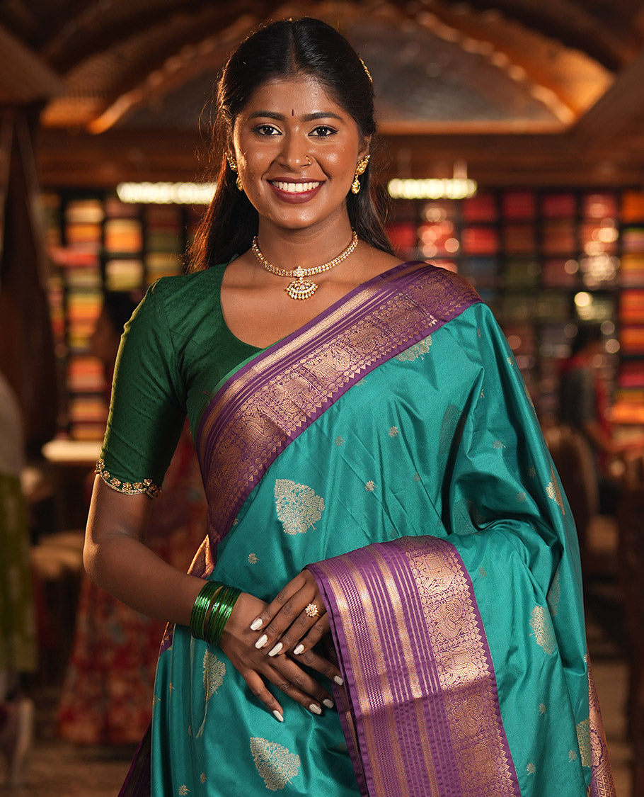 Sapphire Green-Purple Budget Silk Saree, Adorned with Zari Buttas, Complemented by a Contrast Peacock and Elephant Border, Jaal Pallu, and a Contrast Blouse