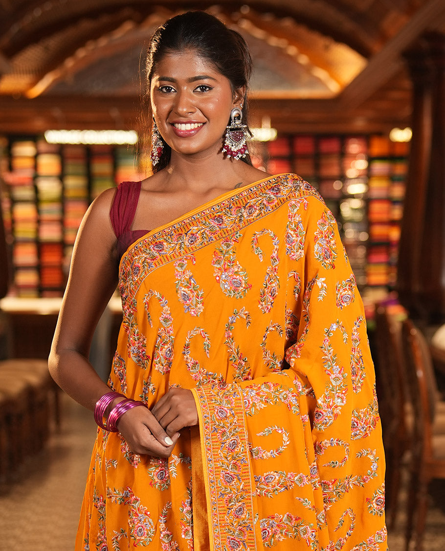 Mustard Georgette Designer Saree Features Color-Thread Paisley Embroidery, a Matching Blouse