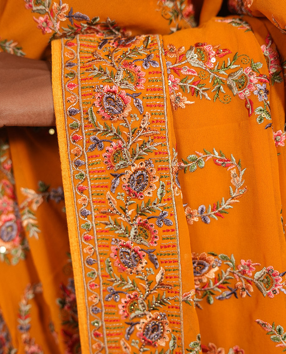 Mustard Georgette Designer Saree Features Color-Thread Paisley Embroidery, a Matching Blouse