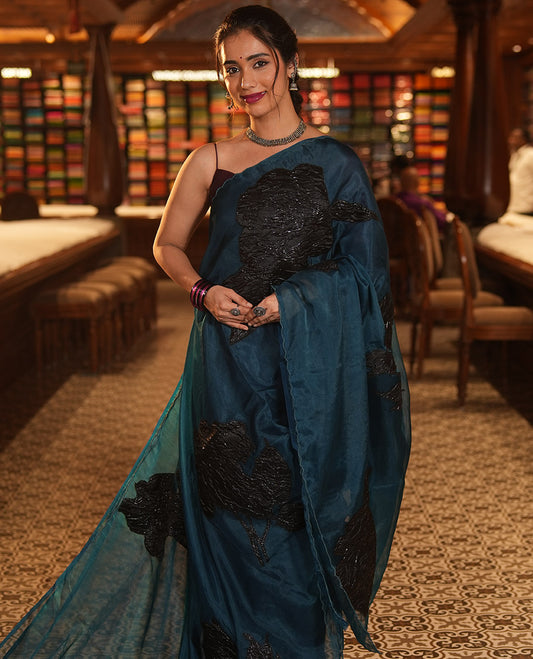 Peacock Blue Turkey Organza Saree Features Floral Applique Embroidery, a Scallop Border, Matching Blouse