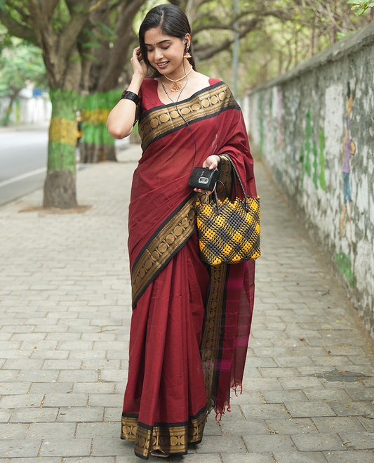 Maroon Plain Chettinad Cotton Saree, Complemented by a Contrast Rudraksham Design Traditional Zari  Border, Subtly Striped Pallu, and Paired with a Matching Blouse