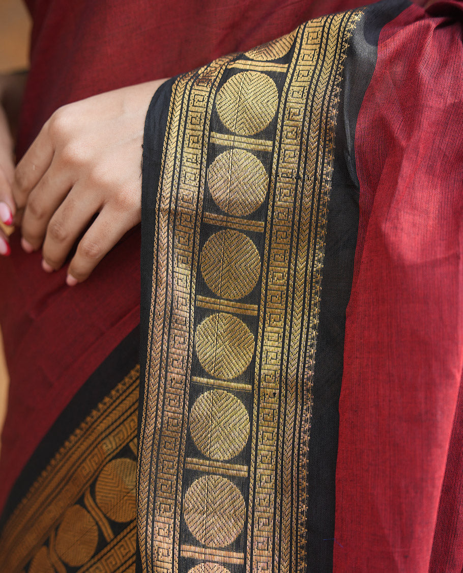 Maroon Plain Chettinad Cotton Saree, Complemented by a Contrast Rudraksham Design Traditional Zari  Border, Subtly Striped Pallu, and Paired with a Matching Blouse