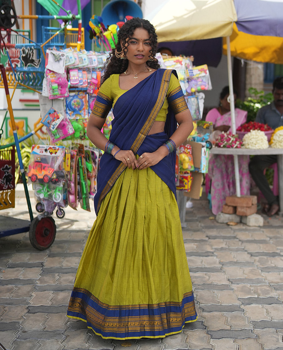 Liril Green-Royal Blue Mercerised Cotton Half-Saree Features Plain Skirt, Contrast Traditional Annam-Motif Border, a Matching Blouse, and Contrast Dhavani