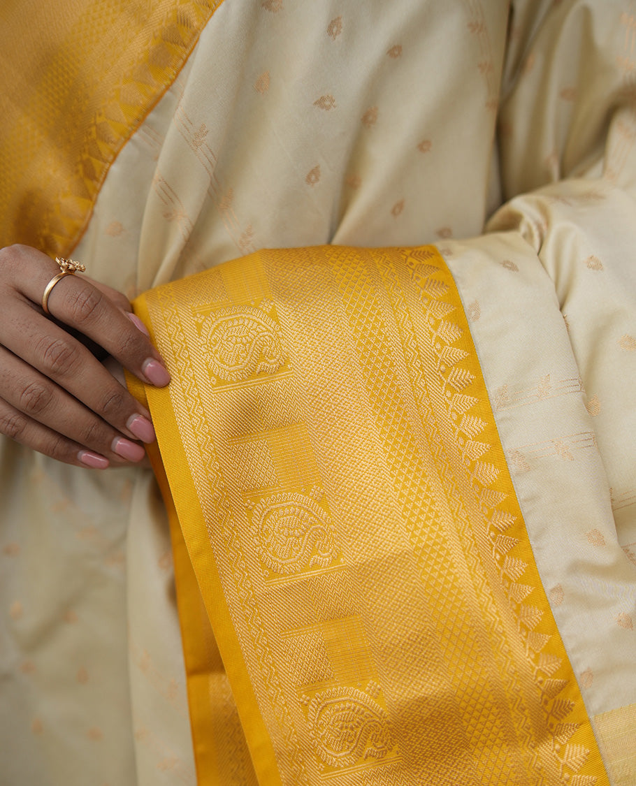 Biscuit-Yellow Budget Silk Saree, Subtly Sparkled with Zari Buttas, a Contrast Traditional Zari Border, Grand Pallu, and a Contrast Blouse
