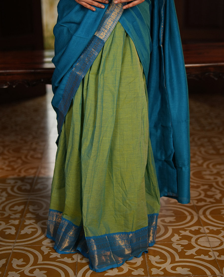 Liril Green-Firozi Blue Chettinad Cotton Half-Saree Featuring Plain Skirt, Contrast Traditional Border, Matching Blouse, Syska Georgette Dhavani