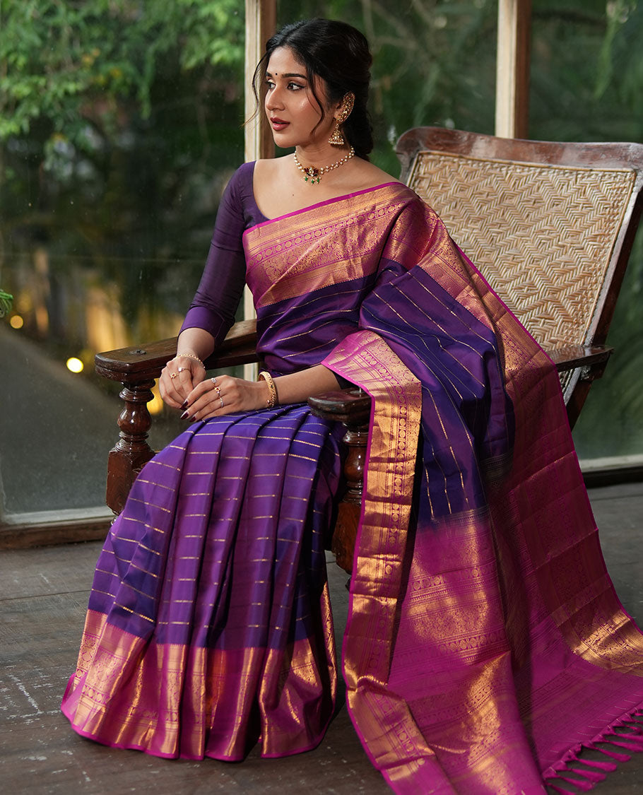 Purple Vasundhara Silk Saree, Enriched with Neli Stripes On Its Body, Complemented by Captivating Contrast Border of Mayil Kann, Vanki, Iru Thalaipakshi, Chakram, and Neli Designs, Grand Pallu, and Paired with a Contrast Blouse