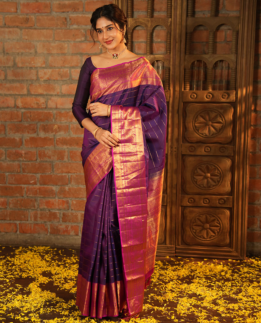 Purple Vasundhara Silk Saree, Enriched with Neli Stripes On Its Body, Complemented by Captivating Contrast Border of Mayil Kann, Vanki, Iru Thalaipakshi, Chakram, and Neli Designs, Grand Pallu, and Paired with a Contrast Blouse