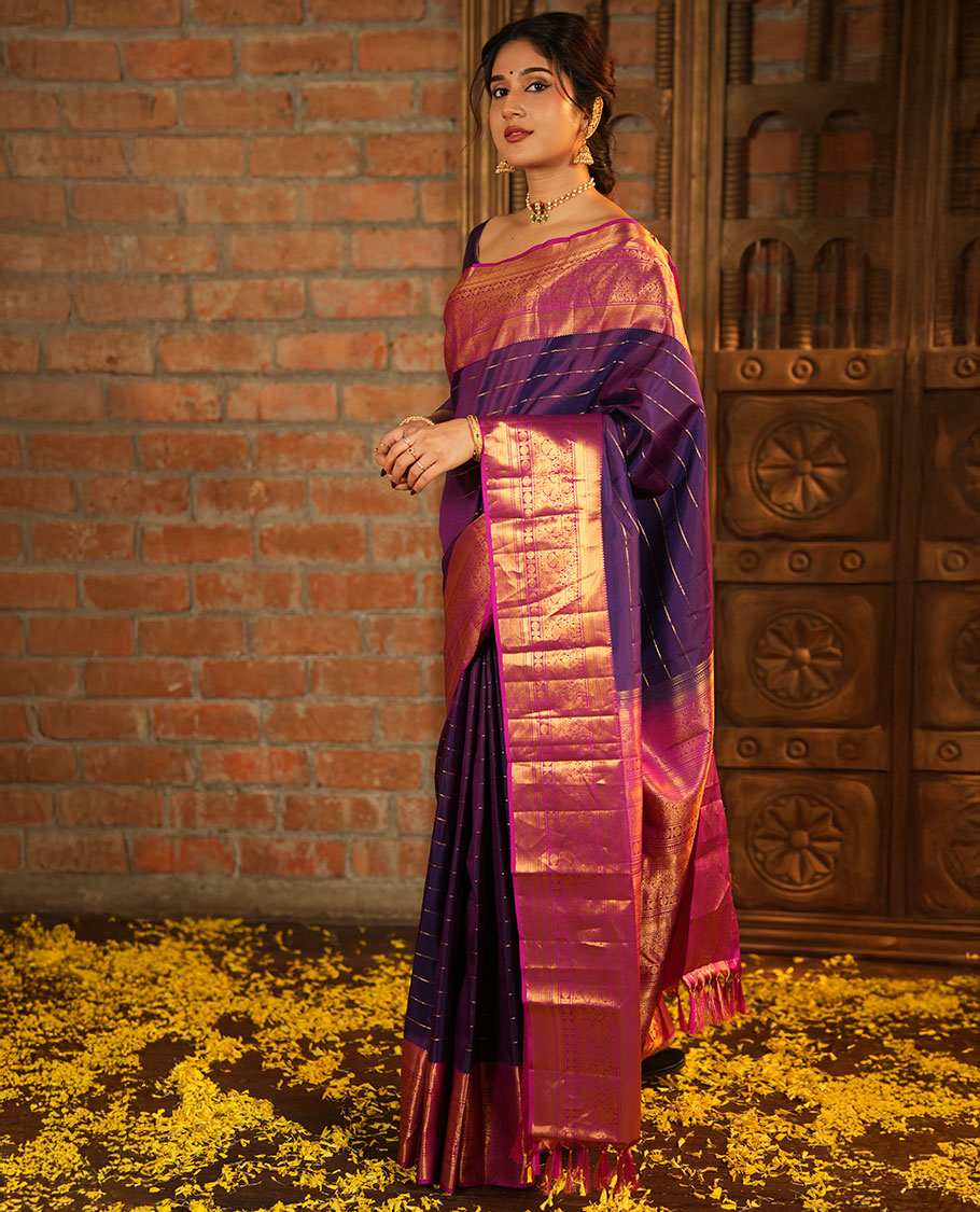 Purple Vasundhara Silk Saree, Enriched with Neli Stripes On Its Body, Complemented by Captivating Contrast Border of Mayil Kann, Vanki, Iru Thalaipakshi, Chakram, and Neli Designs, Grand Pallu, and Paired with a Contrast Blouse