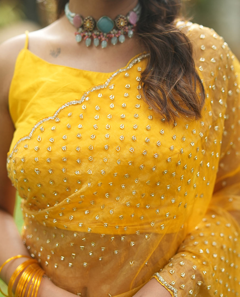 Mustard Organza Glass Tissue Designer Saree With Stonework, a Scallop Border, and a Matching Blouse