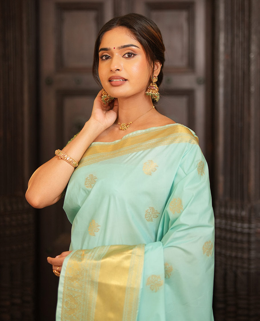 Blue Gift Saree, Adorned with Zari Buttas All Over Its Body, Highlighted by a Traditional Zari Design Border, Scintillating Pallu of Intricate Designs, and Paired with a Matching Blouse
