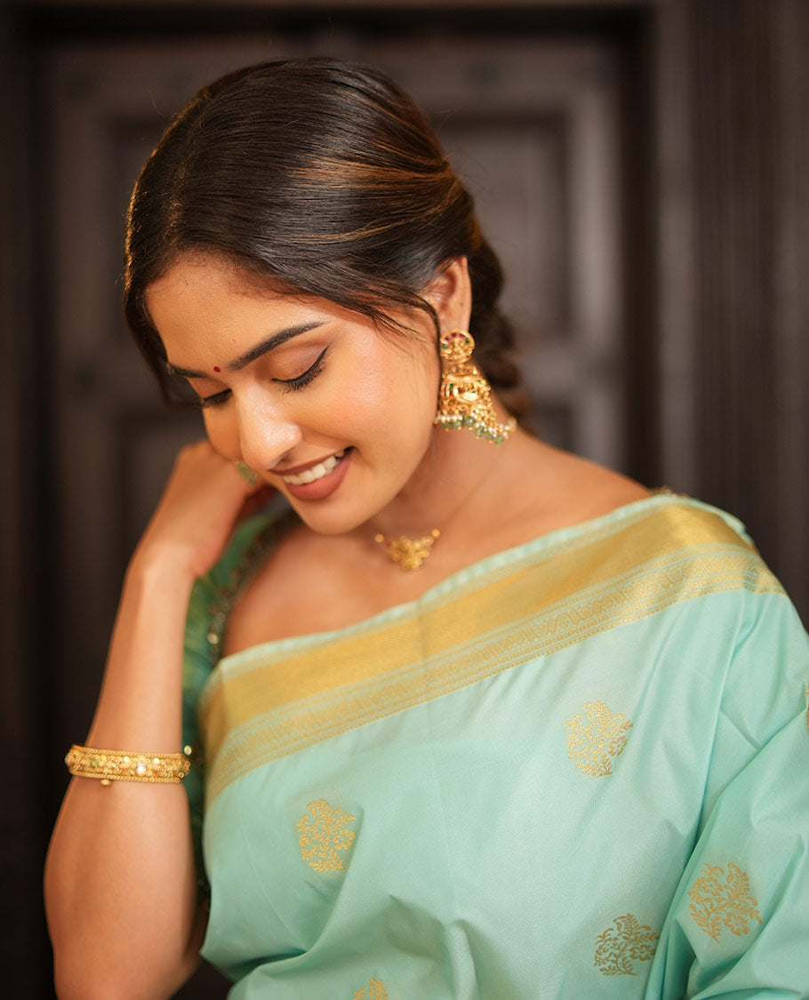 Blue Gift Saree, Adorned with Zari Buttas All Over Its Body, Highlighted by a Traditional Zari Design Border, Scintillating Pallu of Intricate Designs, and Paired with a Matching Blouse