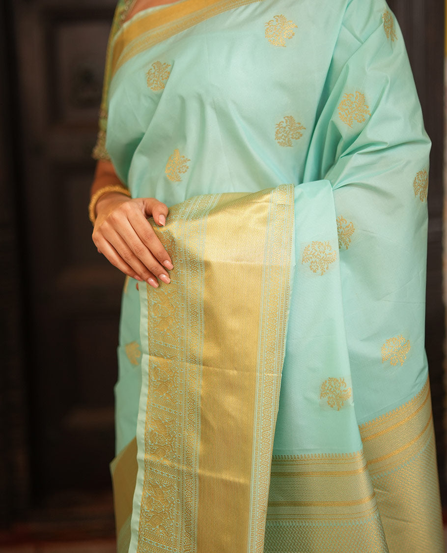 Blue Gift Saree, Adorned with Zari Buttas All Over Its Body, Highlighted by a Traditional Zari Design Border, Scintillating Pallu of Intricate Designs, and Paired with a Matching Blouse