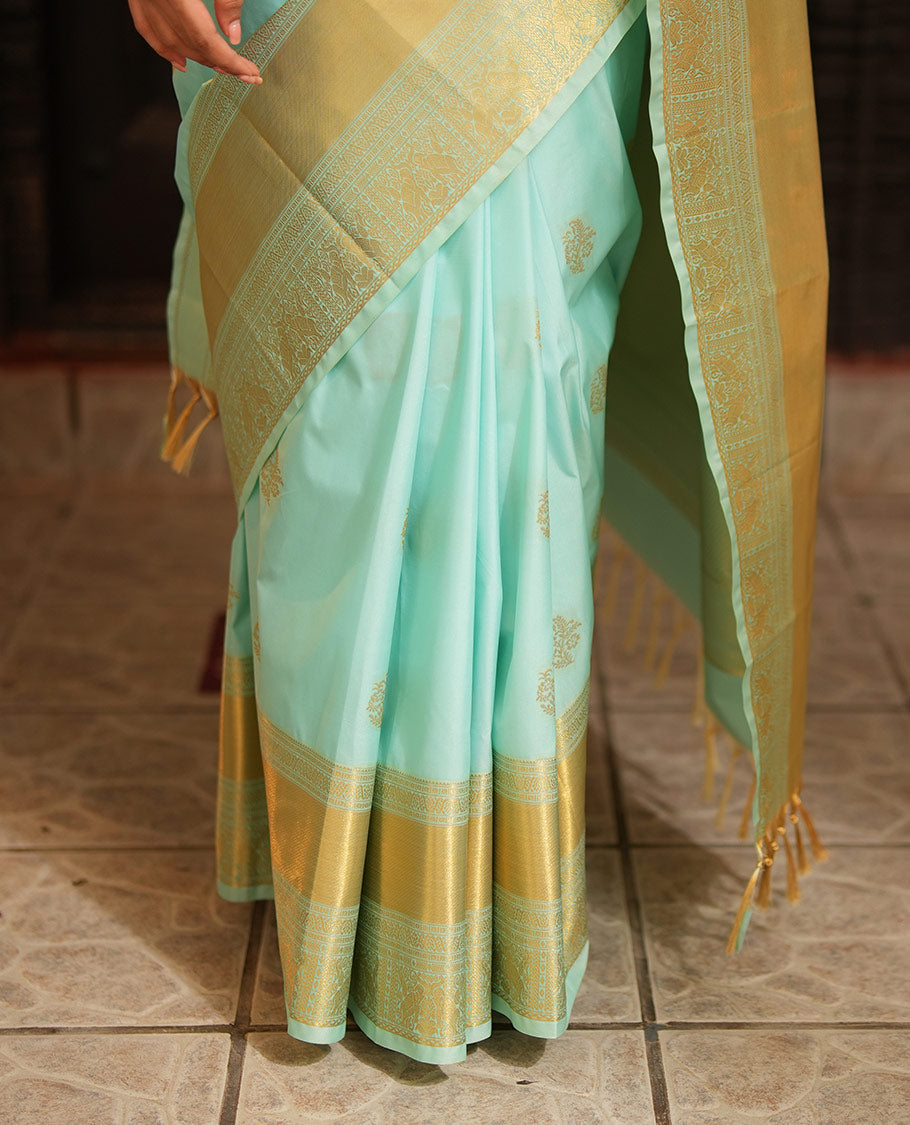 Blue Gift Saree, Adorned with Zari Buttas All Over Its Body, Highlighted by a Traditional Zari Design Border, Scintillating Pallu of Intricate Designs, and Paired with a Matching Blouse