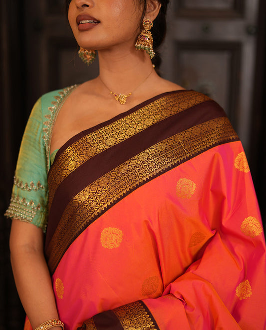 Pink Gift Saree, Accentuated with Zari Buttas All Over Its Body, Complemented by a Contrast Traditional Zari Design Border, Grand Pallu of Jaal Designs, and Paired with a Contrast Blouse
