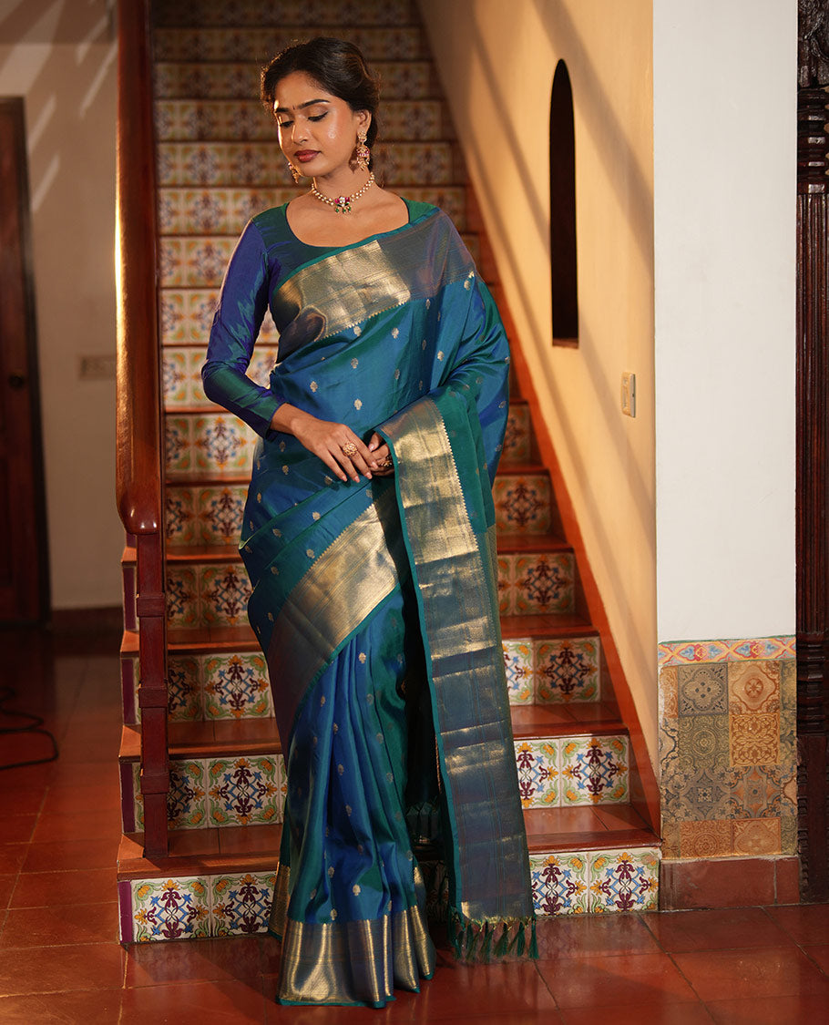 Blue Vasundhara Lite Silk Mix Saree, Enriched with Zari Buttas All Over Its Body, Highlighted by a Zari Border of Traditional Zari Designs, Grandly Zari Decked Up Pallu, and Paired with a Matching Blouse