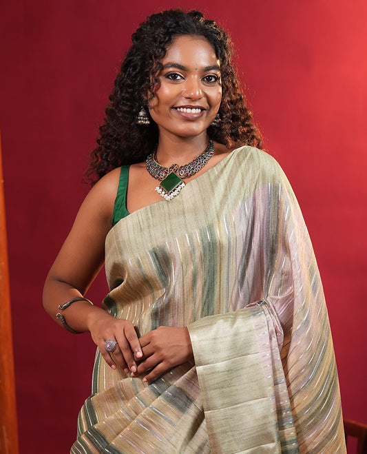 Pista Green Striped Semi-Tussar Silk Saree, Adorned with Vertical Zari Stripes on Its Body, Subtle Zari Border, a Subtle Pallu, and Paired with a Contrast Striped Blouse