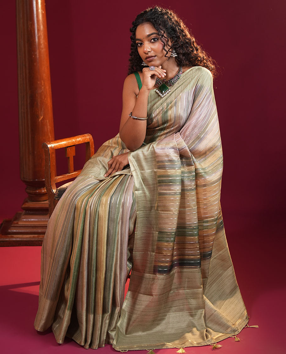 Pista Green Striped Semi-Tussar Silk Saree, Adorned with Vertical Zari Stripes on Its Body, Subtle Zari Border, a Subtle Pallu, and Paired with a Contrast Striped Blouse