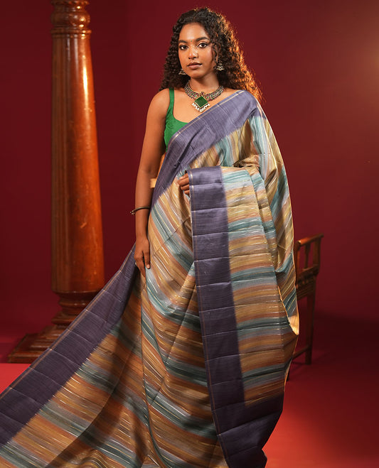 Blue Striped Semi-Tussar Silk Saree, Adorned with Vertical Zari Stripes on Its Body, Subtle Zari Border, a Subtle Pallu, and Paired with a Contrast Striped Blouse