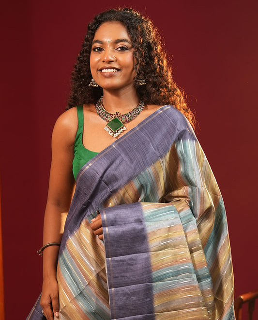 Blue Striped Semi-Tussar Silk Saree, Adorned with Vertical Zari Stripes on Its Body, Subtle Zari Border, a Subtle Pallu, and Paired with a Contrast Striped Blouse