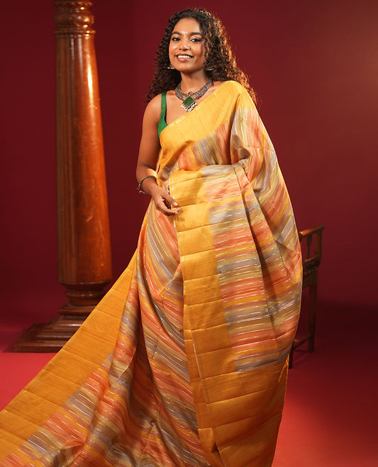 Yellow Striped Semi-Tussar Silk Saree, Adorned with Vertical Zari Stripes on Its Body, Subtle Zari Border, a Subtle Pallu, and Paired with a Contrast Striped Blouse