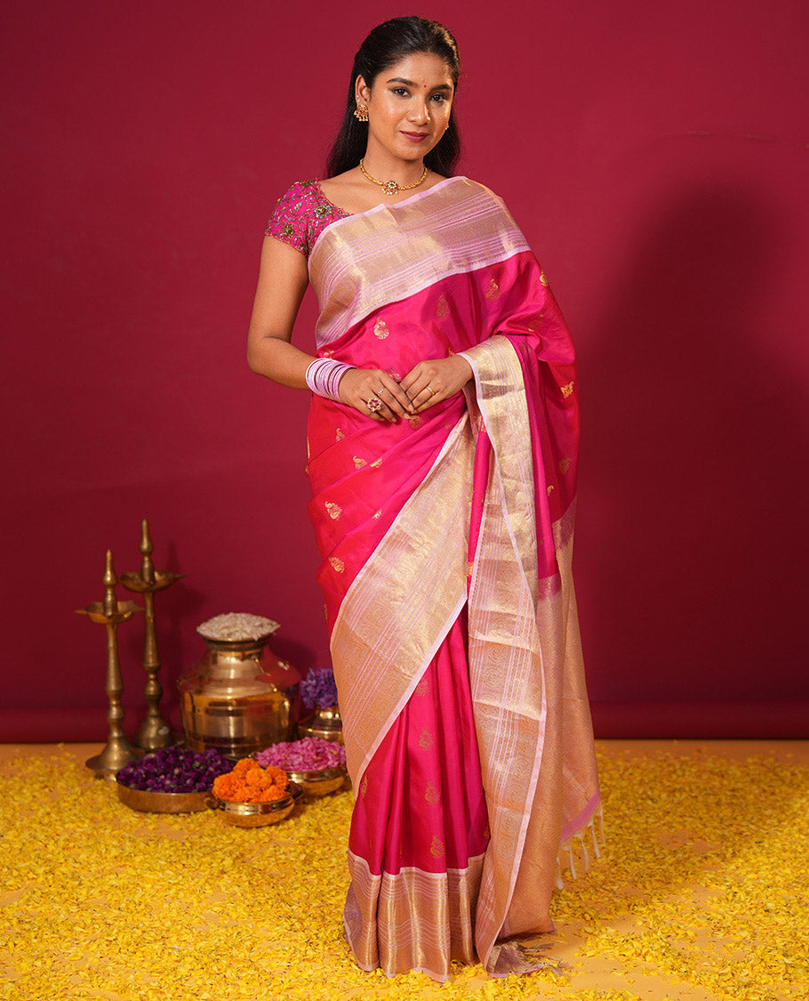 Rani pink zari buttas silk saree, contrast border of muthu, diamond, kathir, and mayil kann designs, and jaal pallu