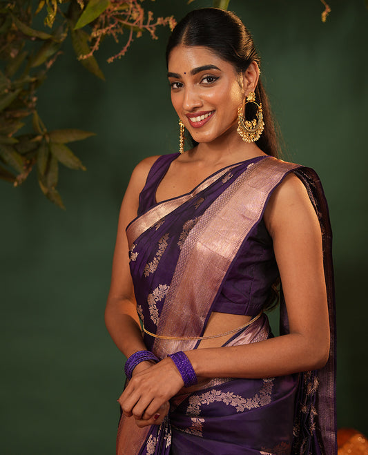 Purple Vasundhara Silk Saree, Accentuated with Floral Jaal Jacquard, Complemented by Zari Border of Thilakam Mokku, Lavangam, and Jaal Designs, Grandly Woven Pallu, and Paired with a Matching Blouse