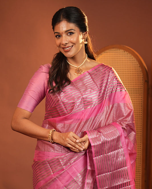Pink Tussar Silk Saree, Highlighted by Horizontal Zari Stripes Running All Over Its Body, Highlighted by Zari Striped Border, Zari Gleamed up Pallu, and Paired with a Matching Blouse