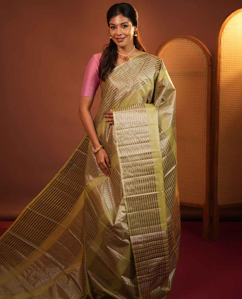 Green Tussar Silk Saree, Highlighted by Horizontal Zari Stripes Runnin